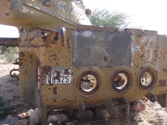 Plate for a bombed out tank in Somalia